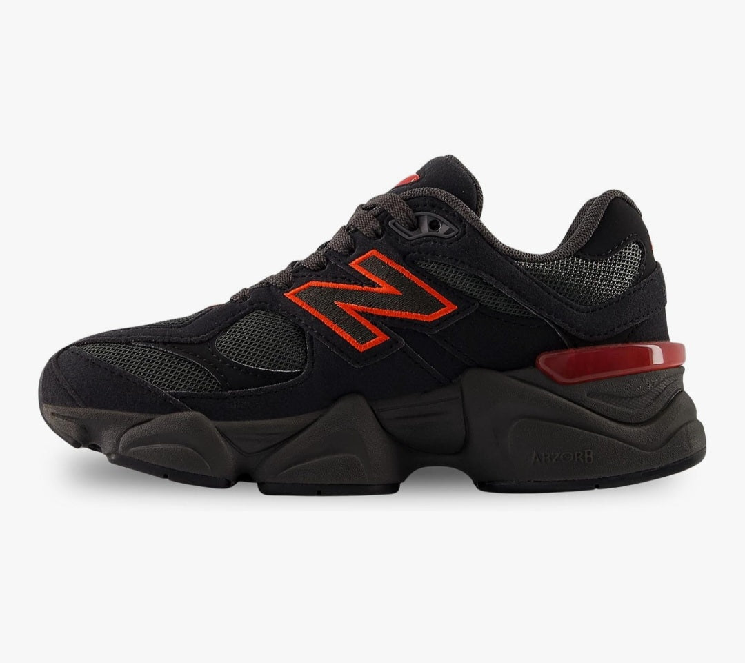 New Balance 9060 black and red sneakers.
