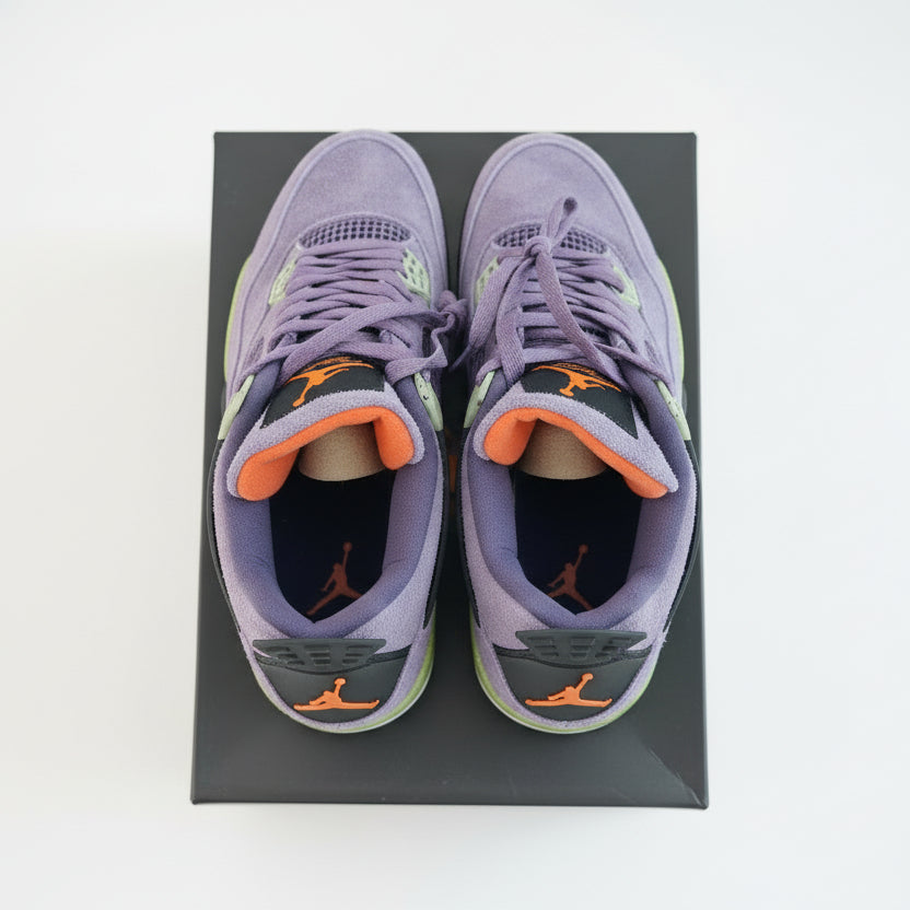 Air JORDAN 4 RETRO CANYON PURPLE...